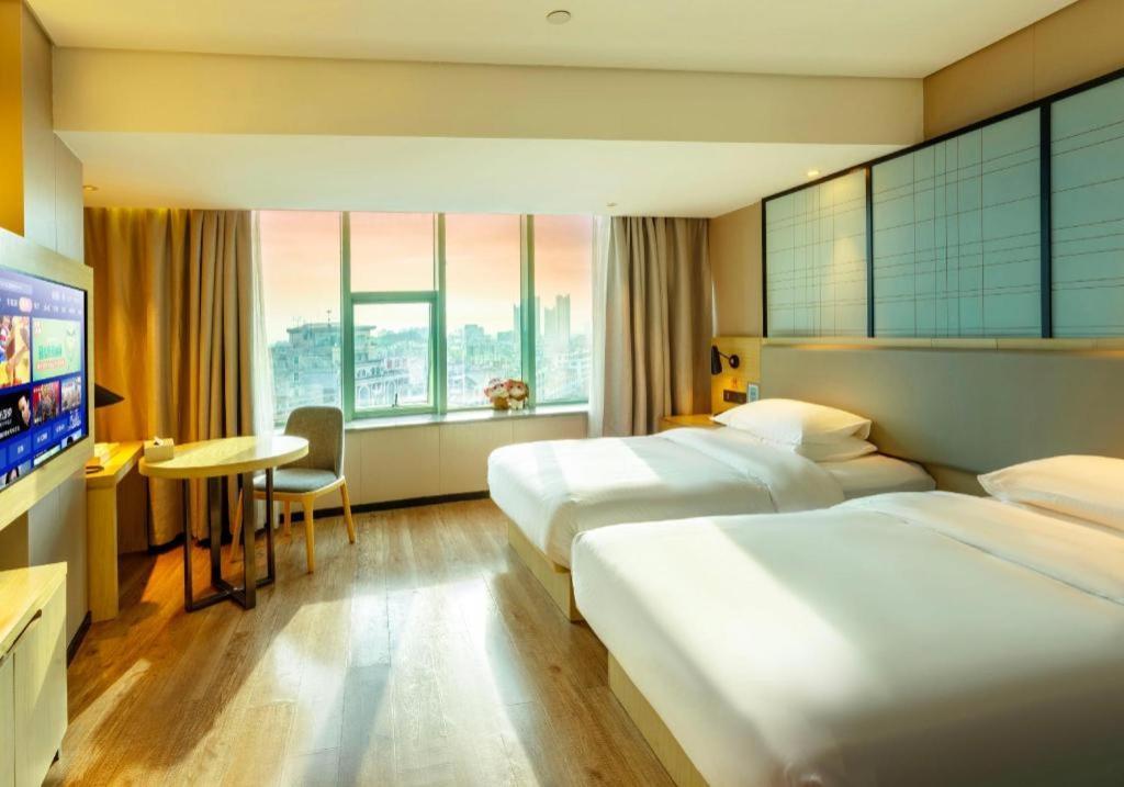 Echarm Hotel Yangjiang Baili Plaza Екстер'єр фото