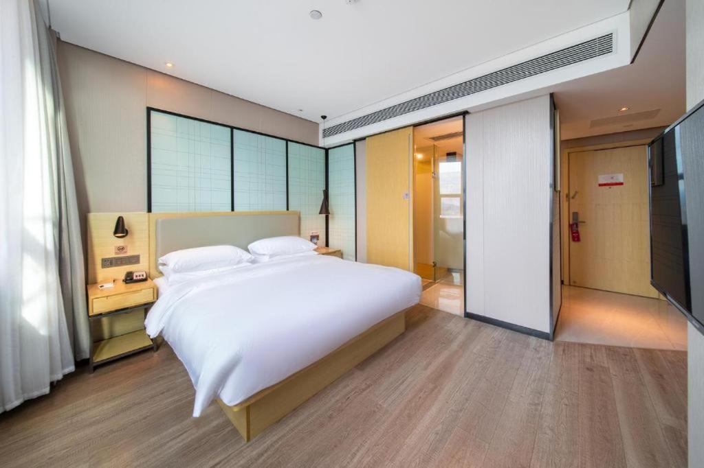 Echarm Hotel Yangjiang Baili Plaza Екстер'єр фото