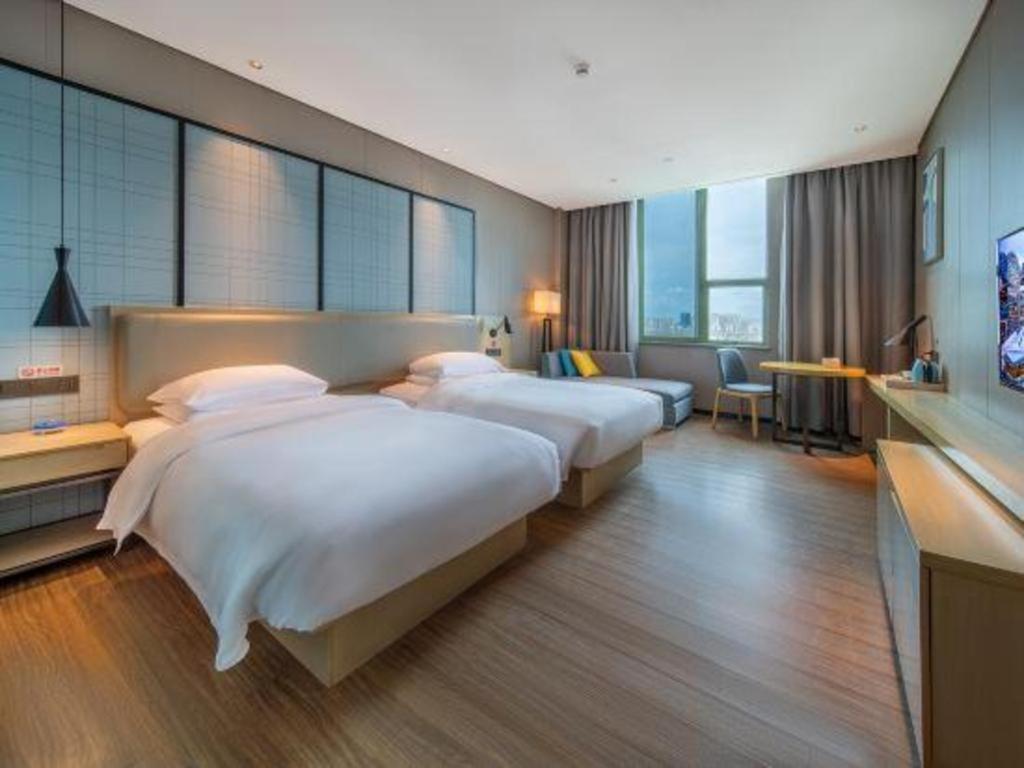 Echarm Hotel Yangjiang Baili Plaza Екстер'єр фото