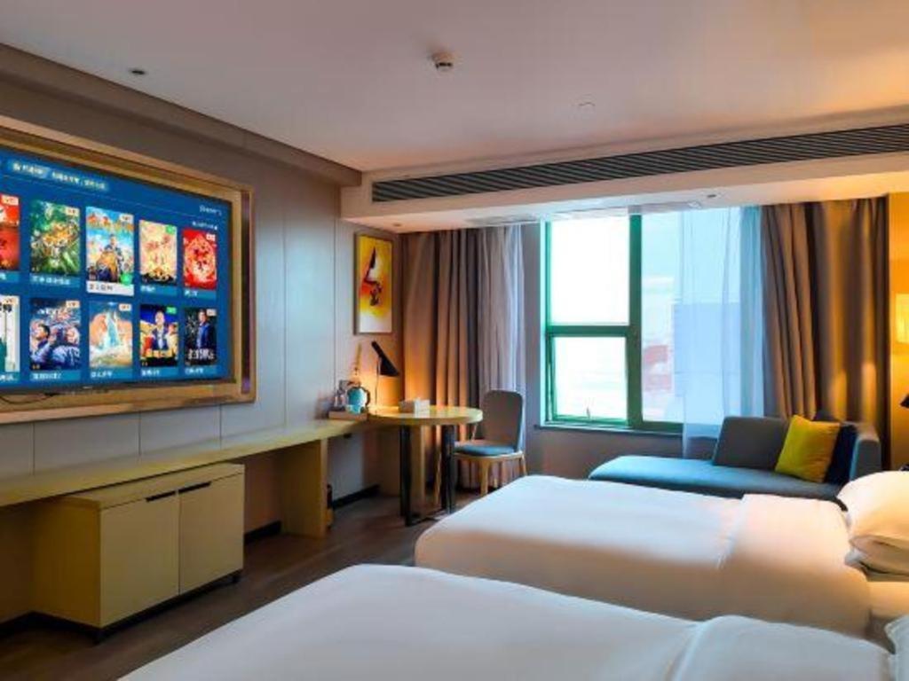 Echarm Hotel Yangjiang Baili Plaza Екстер'єр фото