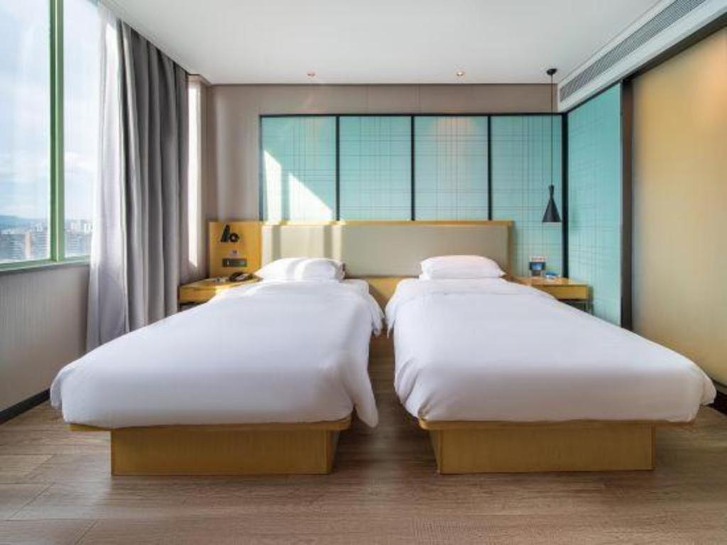 Echarm Hotel Yangjiang Baili Plaza Екстер'єр фото