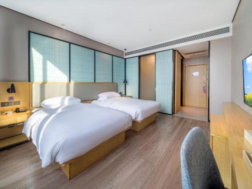 Echarm Hotel Yangjiang Baili Plaza Екстер'єр фото