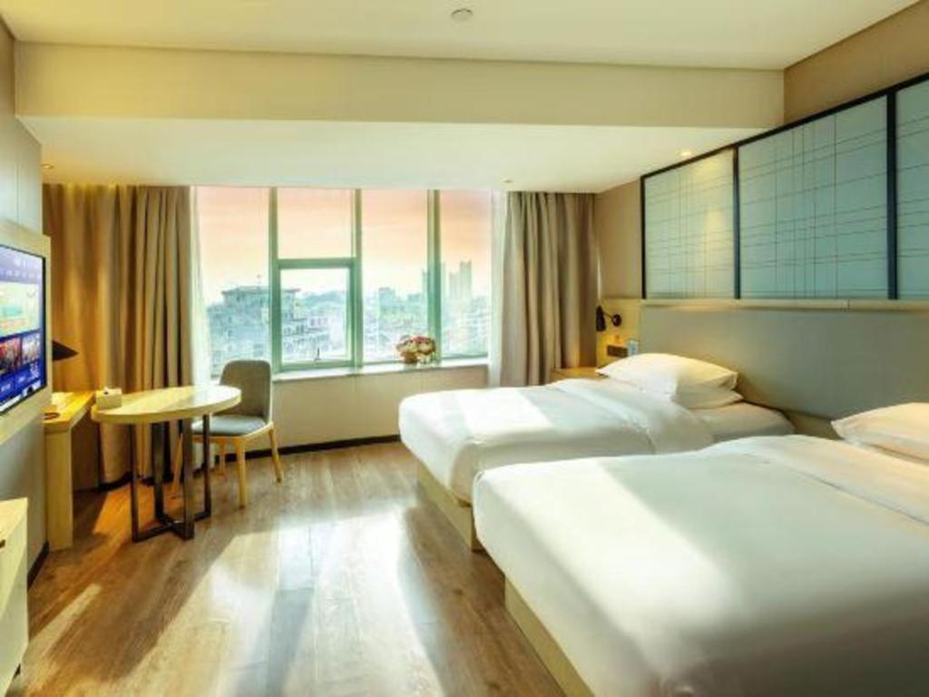 Echarm Hotel Yangjiang Baili Plaza Екстер'єр фото