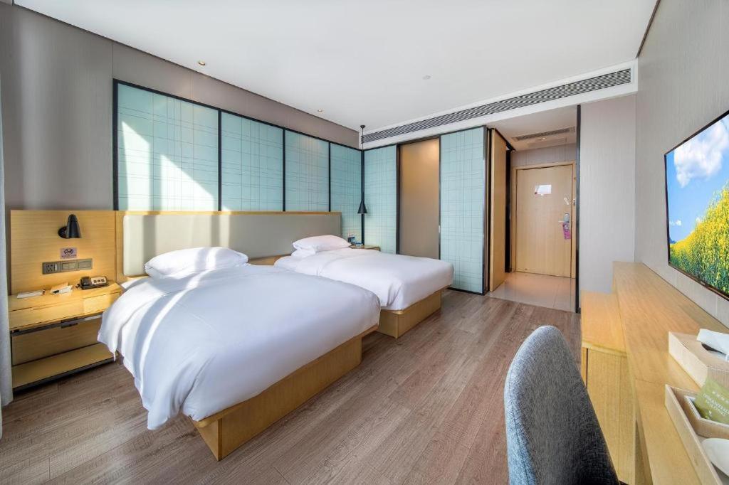 Echarm Hotel Yangjiang Baili Plaza Екстер'єр фото