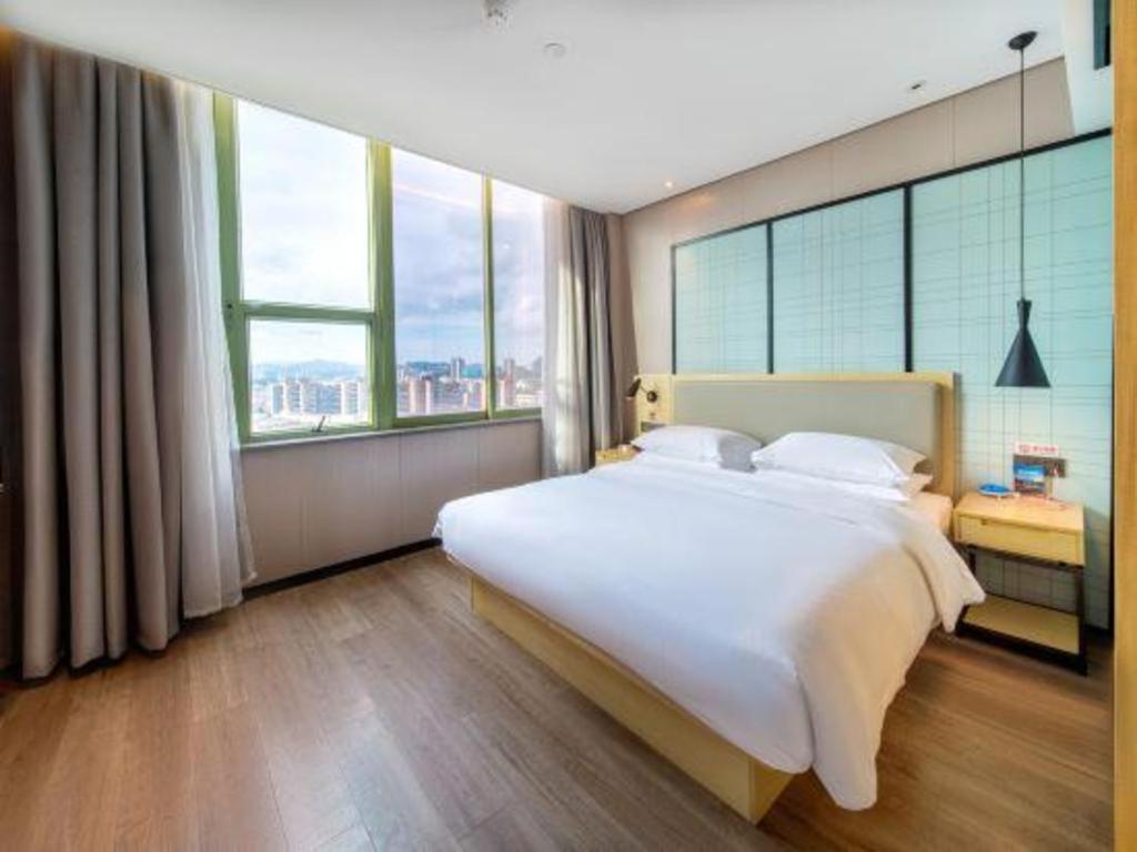 Echarm Hotel Yangjiang Baili Plaza Екстер'єр фото