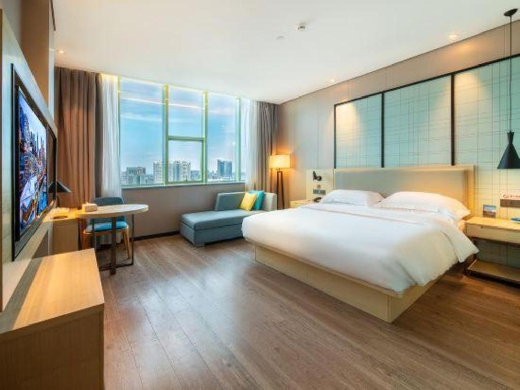 Echarm Hotel Yangjiang Baili Plaza Екстер'єр фото