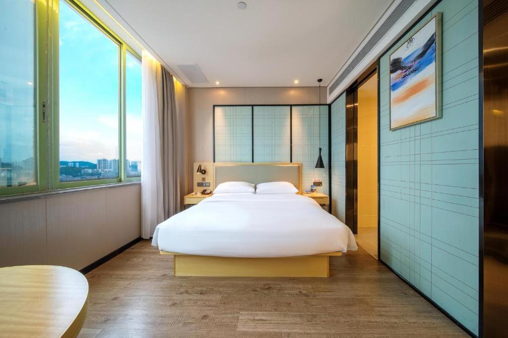Echarm Hotel Yangjiang Baili Plaza Екстер'єр фото