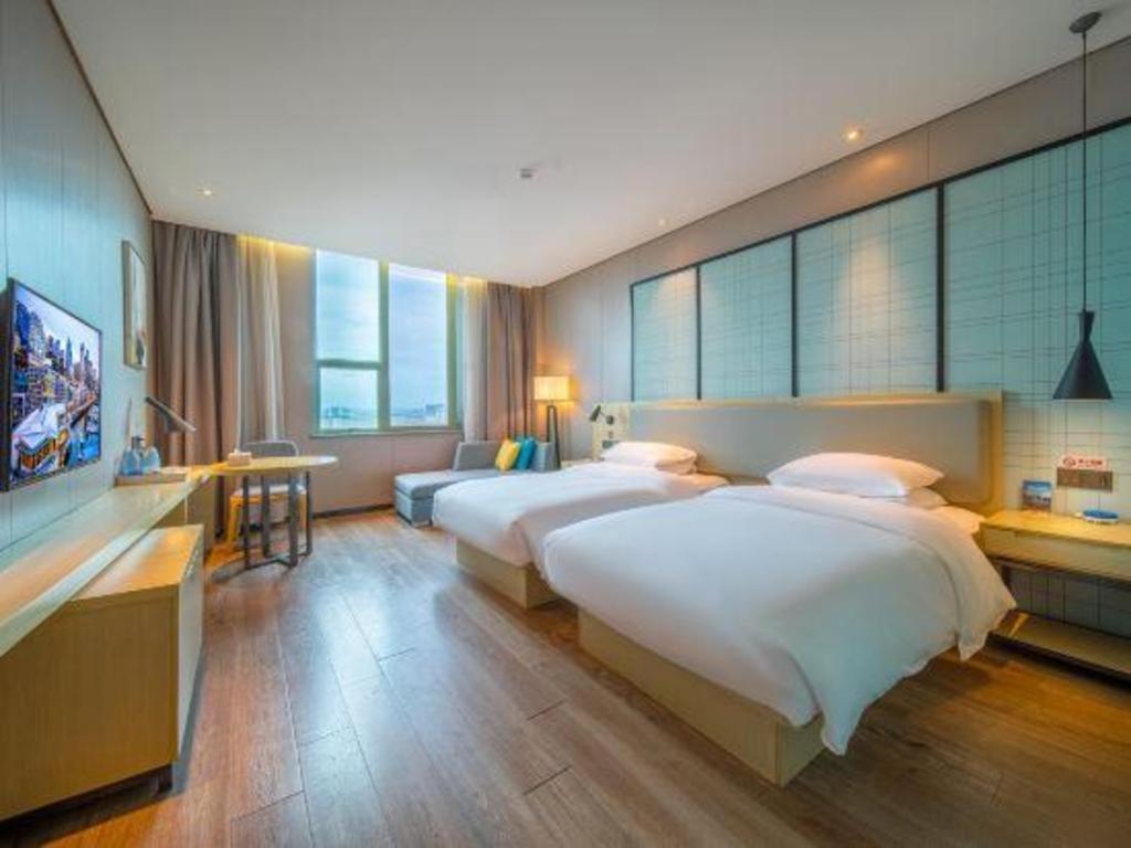 Echarm Hotel Yangjiang Baili Plaza Екстер'єр фото