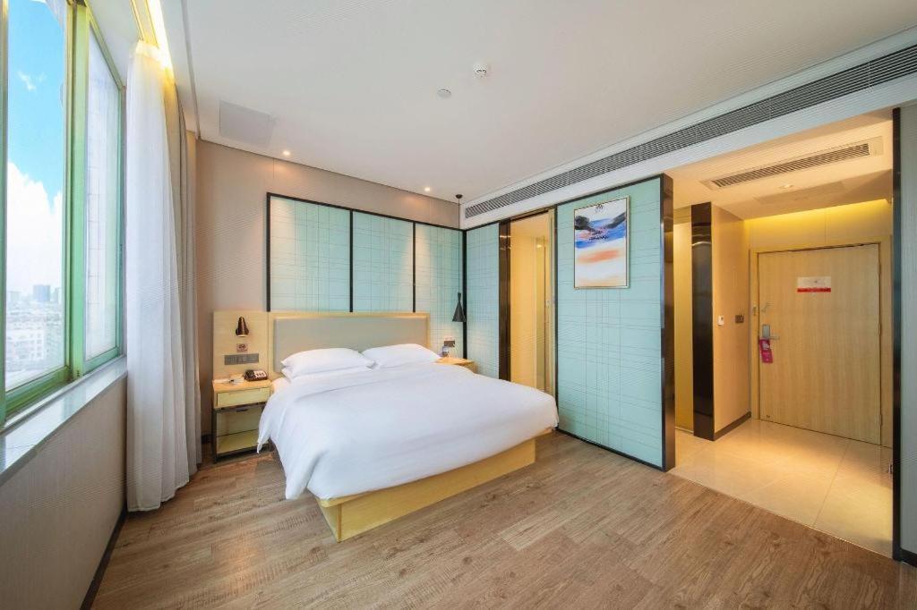 Echarm Hotel Yangjiang Baili Plaza Екстер'єр фото