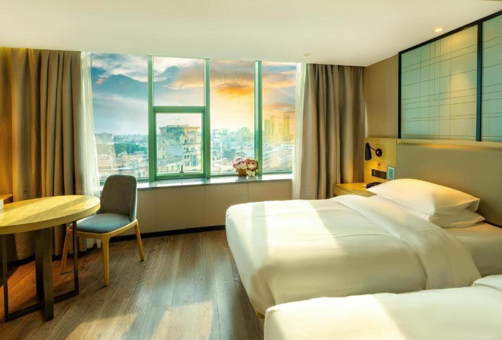 Echarm Hotel Yangjiang Baili Plaza Екстер'єр фото