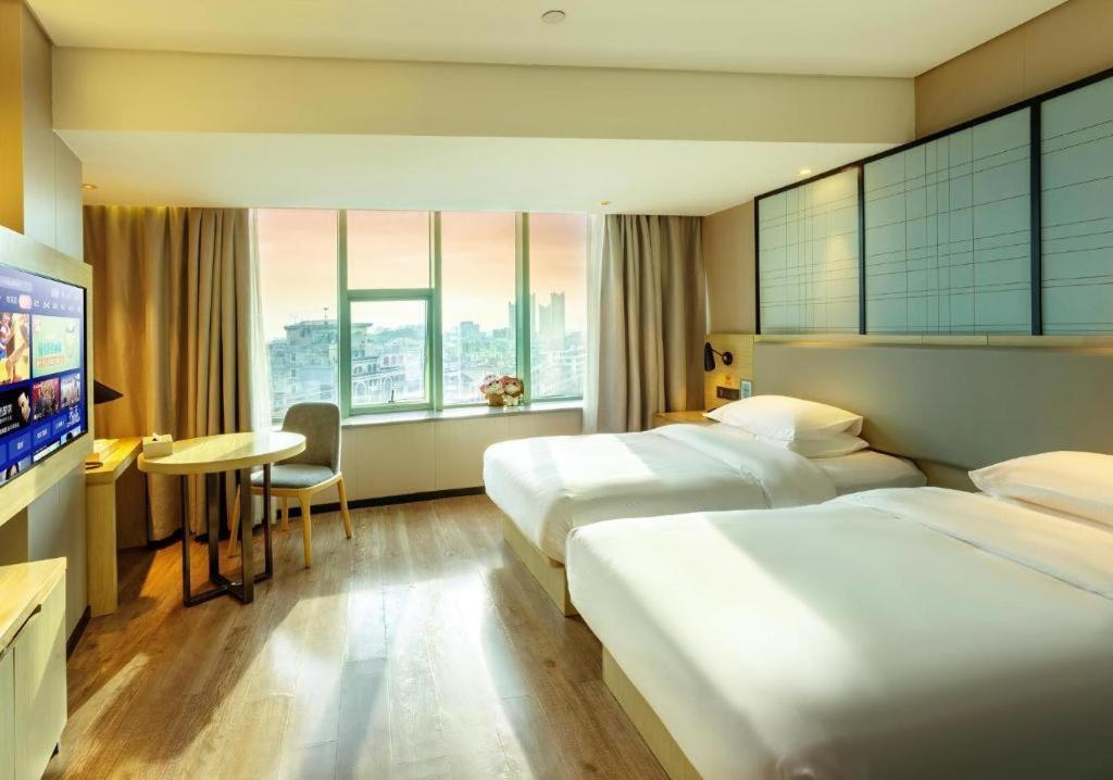 Echarm Hotel Yangjiang Baili Plaza Екстер'єр фото
